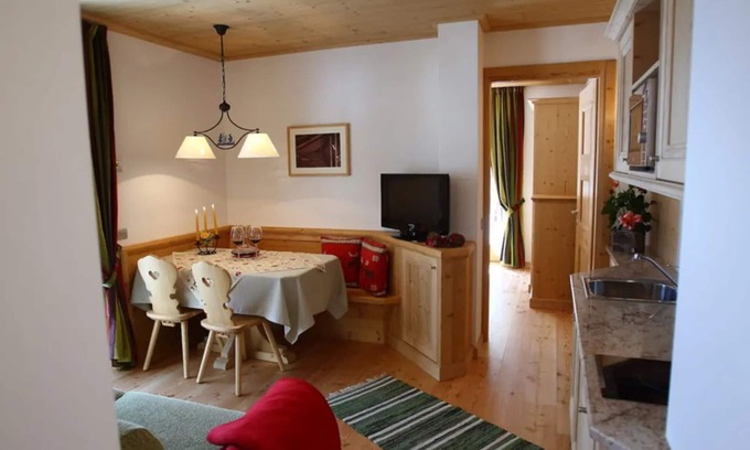 Rocca Pietore Apartment | Apartment 'Appartamento Bilo 4 - Ombretta' with Mountain View, Shared Garden and Wi-Fi