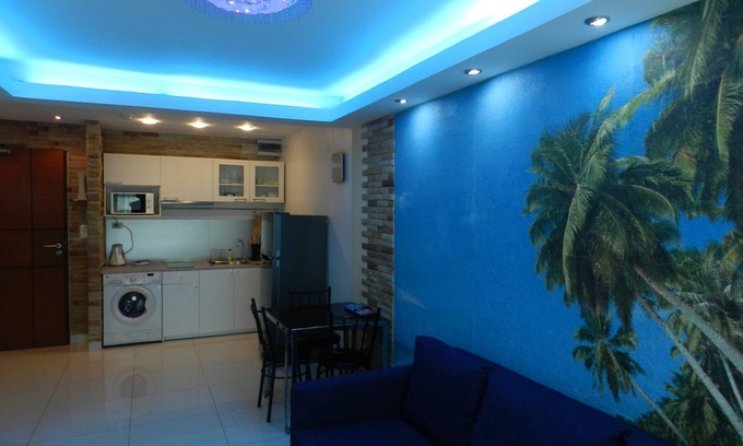 Jomtien Apartment | Apartment bedroom + living room.