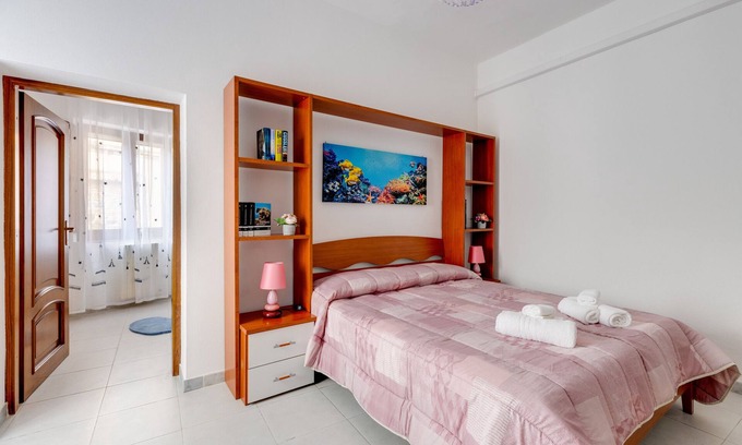 Oristano Historic Centre Apartment | Apartment 'Casa Miriam' with Private Terrace and Air Conditioning