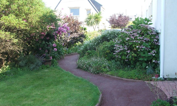 Saint-Cast-le-Guildo Apartment | Apartment in large house with independent entrance and parking, terrace, garden.