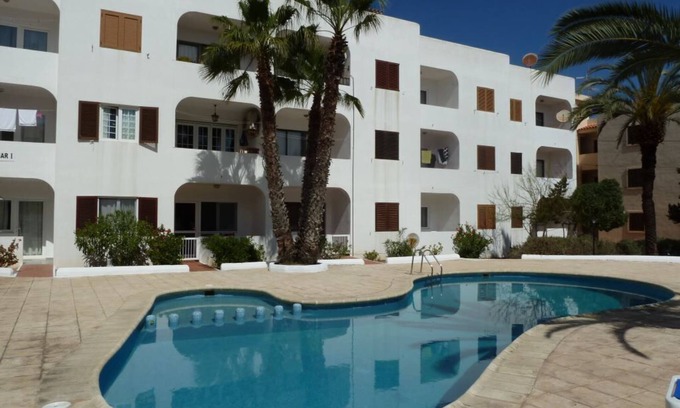 Es Pujols Apartment | Apartment in Es Pujols, close to the beach, family friendly, pool, free WiFi, 2 + people