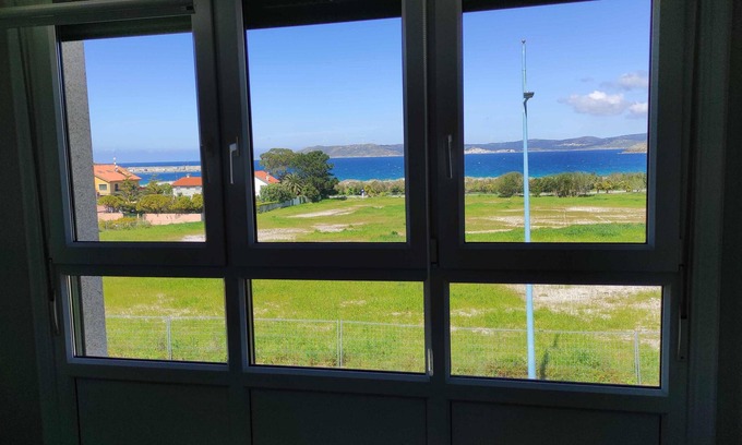 Laxe Apartment | Apartment in Laxe - Beachfront