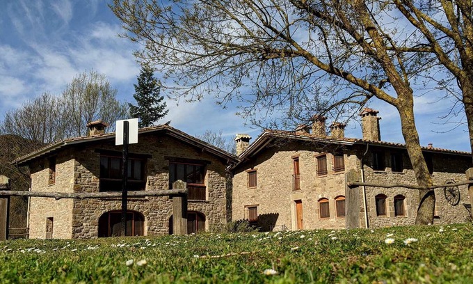 Santa Pau Apartment | Apartment 'Mas El Carrer - Groc' with Mountain View, Shared Pool and Wi-Fi