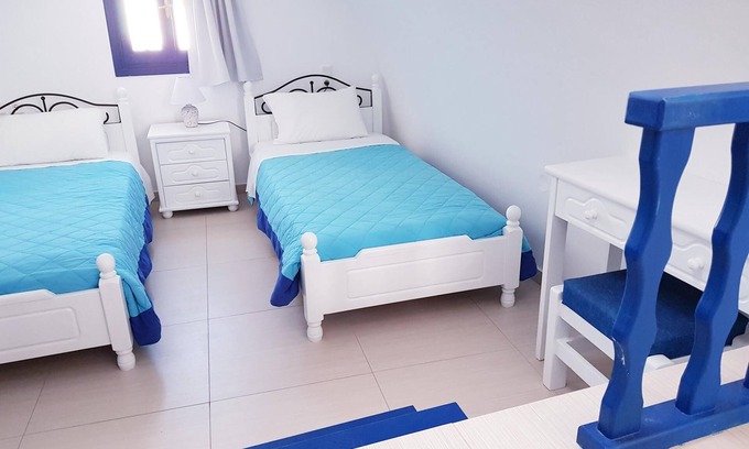 Perivolos Apartment | Apartment with Οutdoor Hydro-Massage @ White & Blue