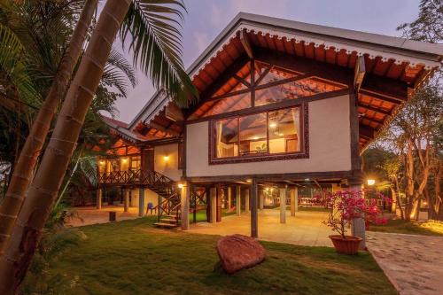 Malavli Villa | Aranyam Villa by StayVista with Modern wooden interiors, Kidszone, Indoor games & plunge pool
