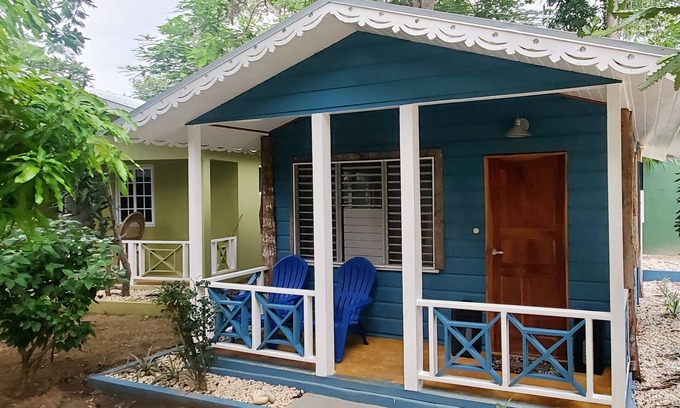 West End Cottage | Bak A Yaad Sapphire Blue Cottage