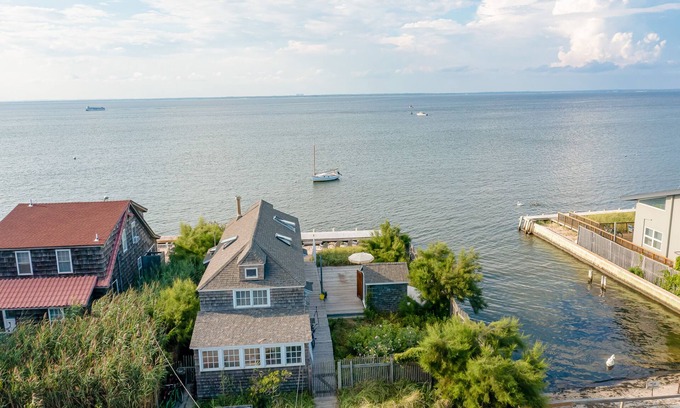 Ocean Bay Park Apartment | Bay-view apartment with deck, grill, enclosed porch, full kitchen, & WiFi