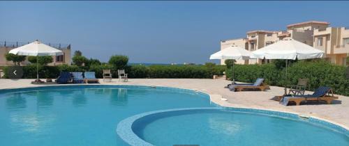 Ras Sudar Apartment | Beach and pools front challet in Ras Sudr families Only عائلات فقط