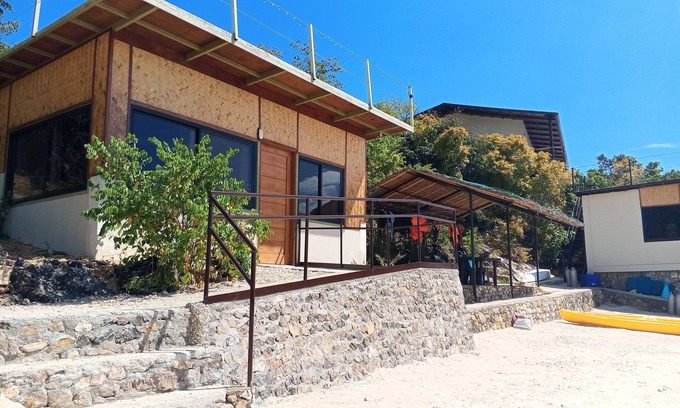 Coron House | Beach Bungalow at Sand Island Ecolodge and Dive Resort