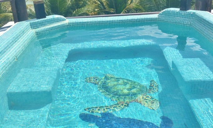 Puerto Bravo Villa | Beach front twin home - central courtyard - great for families and large groups