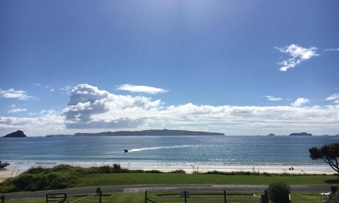 Opito Bay House | Beach front with stunning views of Opito Bay