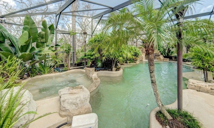 Marineland Acres House | Beach Home with Amazing Oasis Pool, Spa, Waterfall, Fire Pit, Bikes
