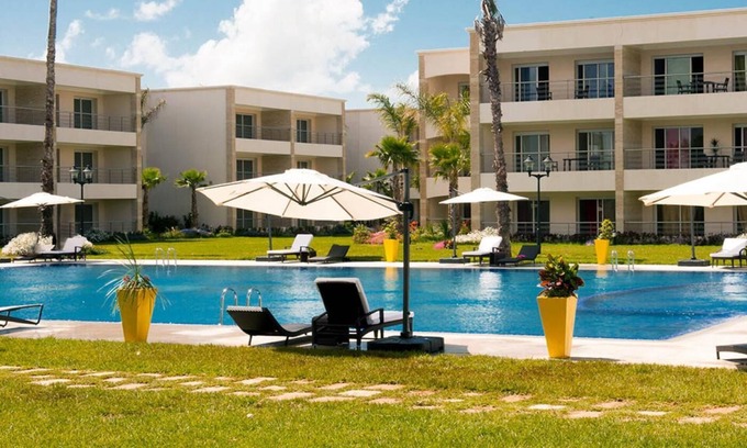 Lamharza Essahel Apartment | Beachfront apartment with swimming pools and beach access