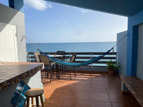 Playa Fortuna Apartment | Beautiful Beach Front Penthouse w Rooftop Terrace