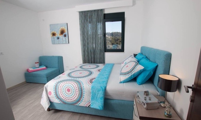Karuc Apartment | Blue apartment is situated in amazing uvala Paljuskovo in Bar.