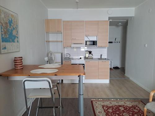 Alppiharju Apartment | Bright and spacious studio in the vibrant city center