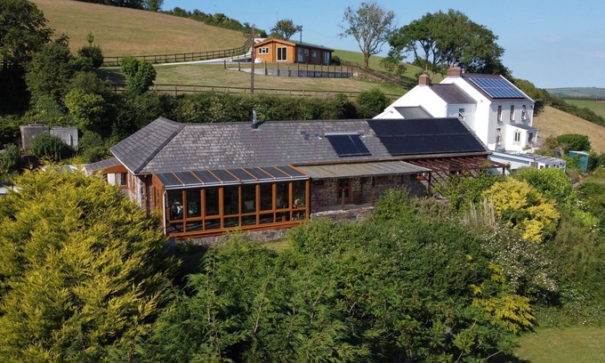 Llanybri Cottage | Brofallen - gorgeous barn conversion with incredible sea views