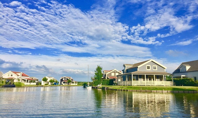 Municipality of Nissewaard House | Bungalow in Holland by Water with Sauna