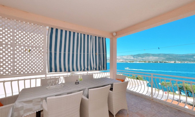 Arbanija Apartment | C - apt w. balcony, shared terrace & the sea view