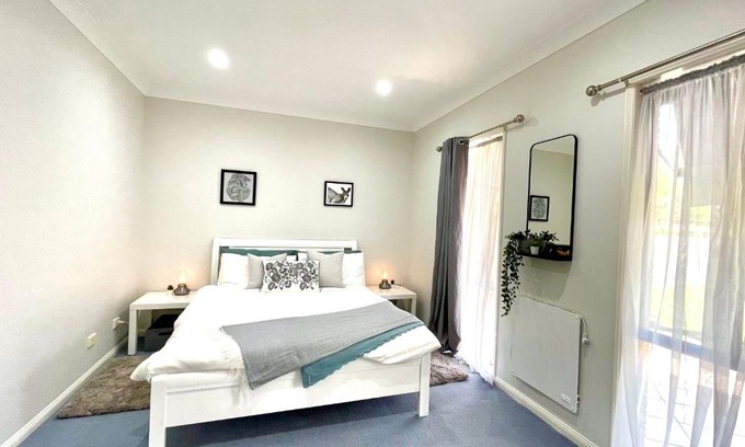 Jimboomba House | Camelot - Homestay - Double Room, private bathroom and private kitchenette on ground floor of our home