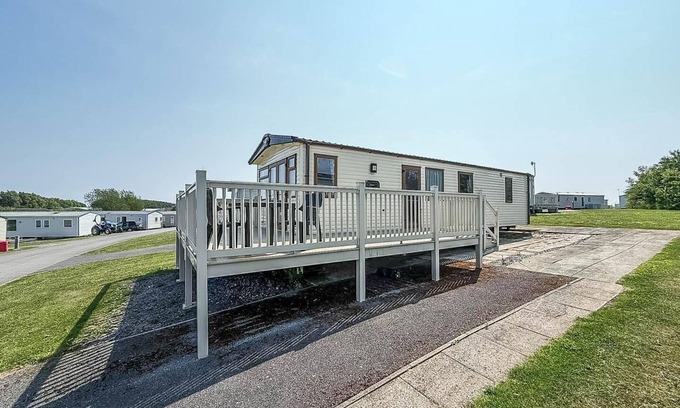 Winestead House | Caravan with a spacious decking area at Sand le Mere Park, Yorkshire ref 71062ME