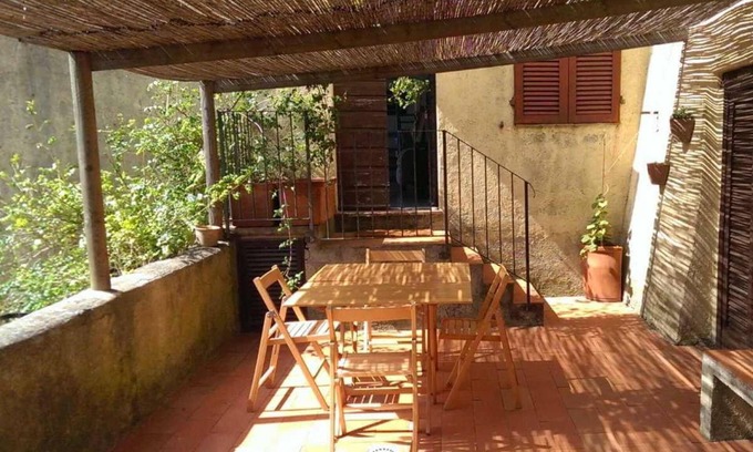 Capalbio Apartment | Casa Blu - private garden, parking, privacy and view