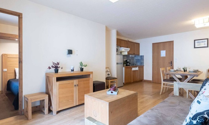 Saint-Lary-Soulan Apartment | Central apartment with pool, sauna, and parking, accommodates 8 with balcony and mountain views