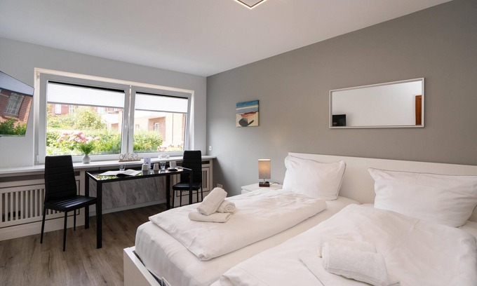 Westerland Apartment | Central app. for 2 persons, WLAN and TV, separate kitchen.