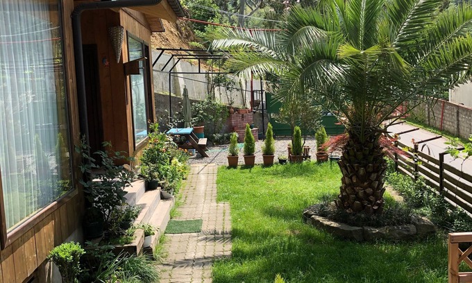 Kvariati Cottage | Chalet Ochos Qokhi - Wooden Cottage with Garden