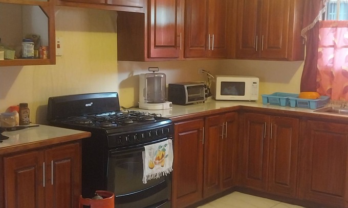 Piarco House | Charming 1-bedroom house with AC, WiFi in peaceful St. Helena Village Piarco