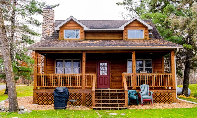 Cushing Cabin | Charming Cabin on Fish Trap Lake: Fireplace, boat lift & beautiful walk out