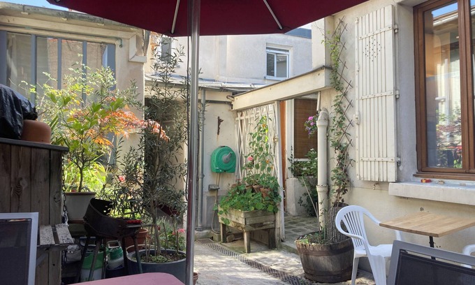 20th Arrondissement Apartment | Charming ground floor studio on quiet courtyard.