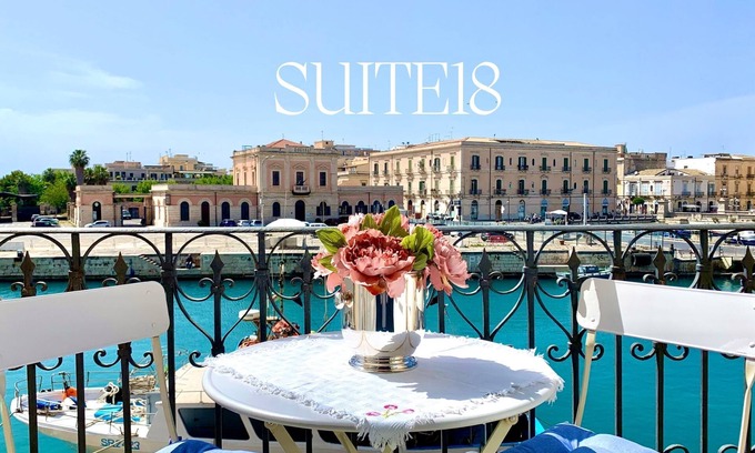 Ortigia Apartment | Charming Sea-View Hideaway in Ortigia. WiFi, Lift and 2 Bikes. Pet-friendly.