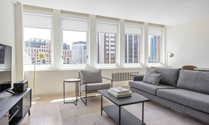 Prudential - St. Botolph Apartment | Classic Back Bay 1BR w/W/D & Gym, near Copley T & Shops, by Blueground