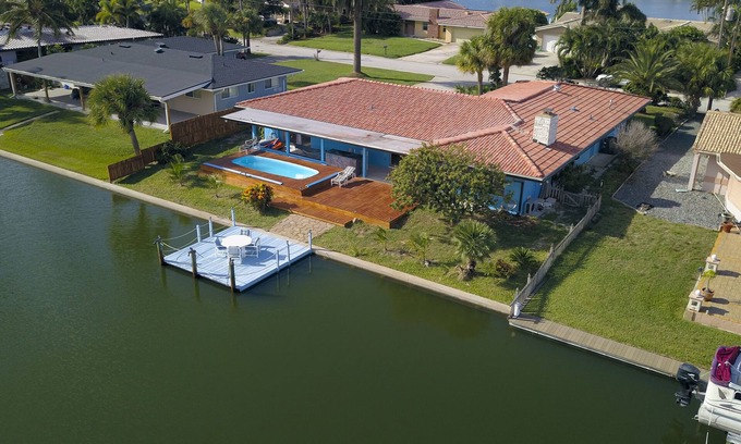 Cocoa Isles Villa | Cocoa Beach canal front heated pool villa