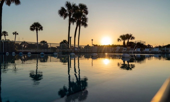 Port Canaveral Condo | Cocoa Beach Towers by Happy Palm Stays