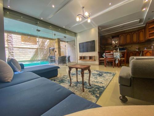 New Cairo Apartment | Comfy Basement Apartment with Private Patio and Garden