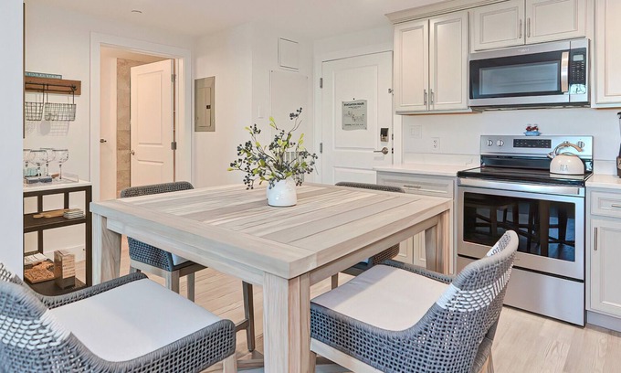 Plymouth Cultural District Condo | Condo unit with balcony overlooking harbor