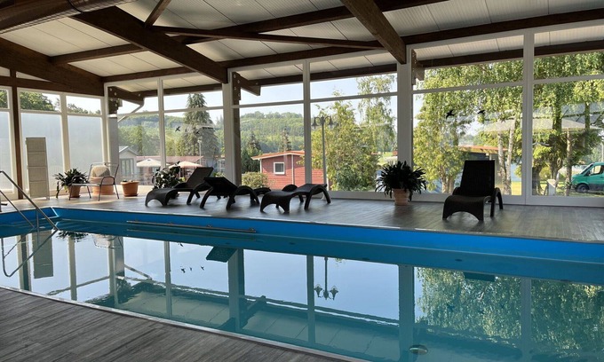 Bad Emstal House | Cosy apartment in villa for 5 guests with WIFI, pool, TV, terrace and pets allowed