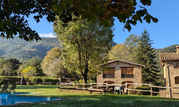 Santa Pau House | Country House 'Mas El Carrer - Baixos' with Mountain View, Shared Pool and Wi-Fi