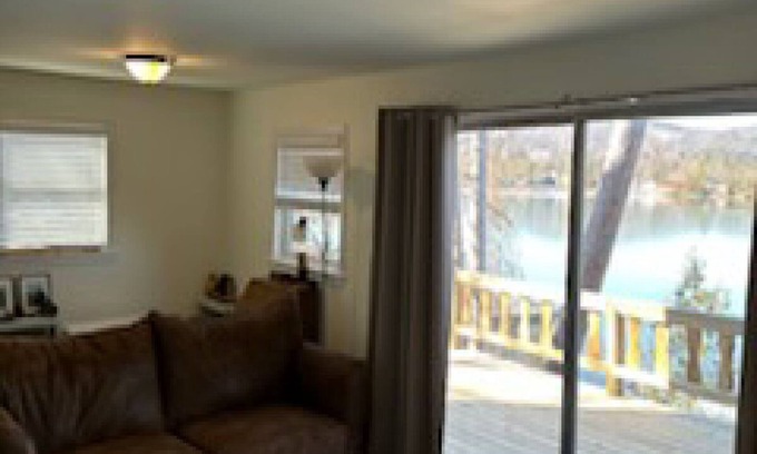 Ticonderoga House | Cozy 2 bedroom cabin at Lake George water's edge with deck & beautiful sunsets.