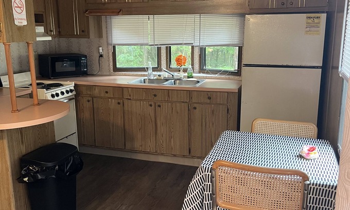 Easton House | Cozy mobile home/cabin on campground in Adams, WI.