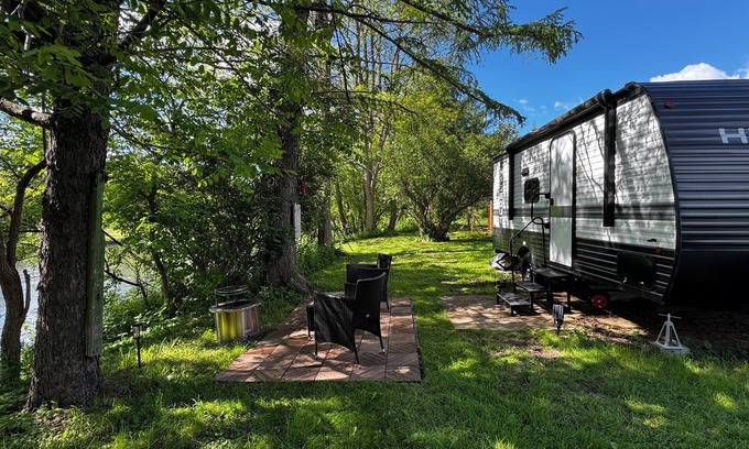 Cortland House | Cozy Riverfront RV with pool and playground in Cortland