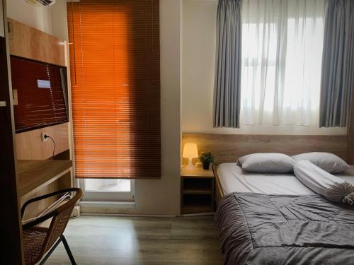 Pondok Aren Apartment | Cozy Studio Emerald Bintaro Icon by alonelyroom