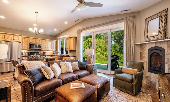 Sheridan Condo | Creekside 2BR/2BA retreat in the Powderhorn Golf Community. Steps from clubhouse, pool, and tennis courts with a private patio overlooking Goose Creek.