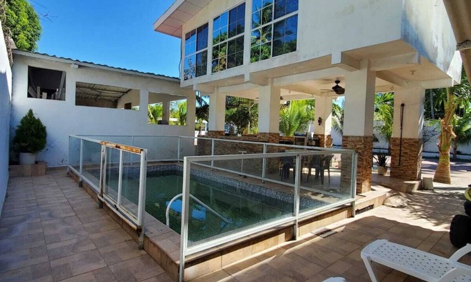 Playa San Diego Resort | Deluxe bedroom with 4 queen beds, accommodates 8 guests, located in El Tenis.