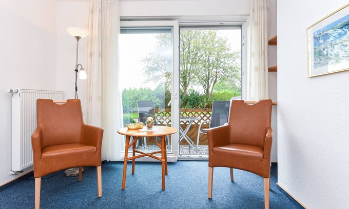 Neuharlingersiel Cottage | Double room with balcony or terrace - Double room in the Hotel-Pension