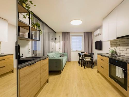 Piasek Połnoc Apartment | Dozen Kittens Apartment