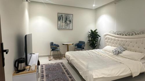 Buraydah Apartment | Elegant studio with 4K screen استديو انيق بشاشة 4K مع دخول ذاتي