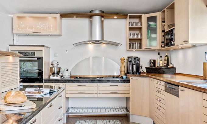 Daugard House | Enjoy a relaxing holiday in this holiday home with sea views near Vejle Fjord.